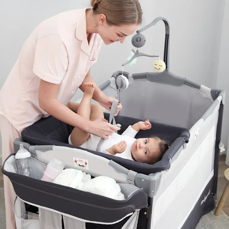 4-in-1 Convertible Baby Crib & Travel Playard with Changing Table and Organizer