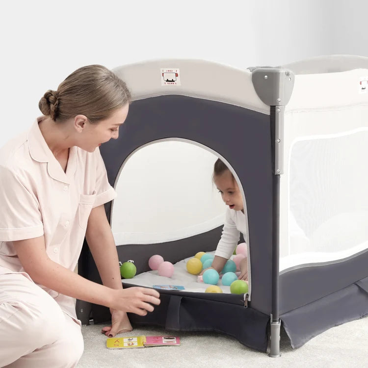 4-in-1 Convertible Baby Crib & Travel Playard with Changing Table and Organizer
